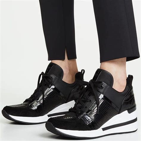 michael kors tennis shoes black and white|Michael Kors high heel sneakers.